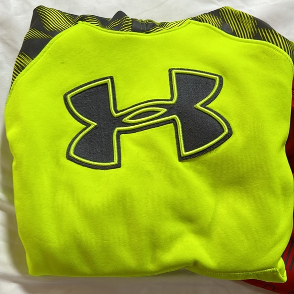 boys large yellow under armor sweatshirt. Has some marks and signs of wear. - Picture 2 of 2